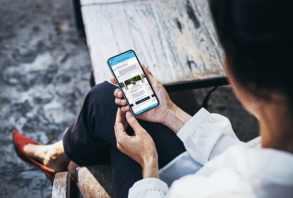 An account holder choosing a personal banker inside a mobile digital banking app powered by Agent IQ